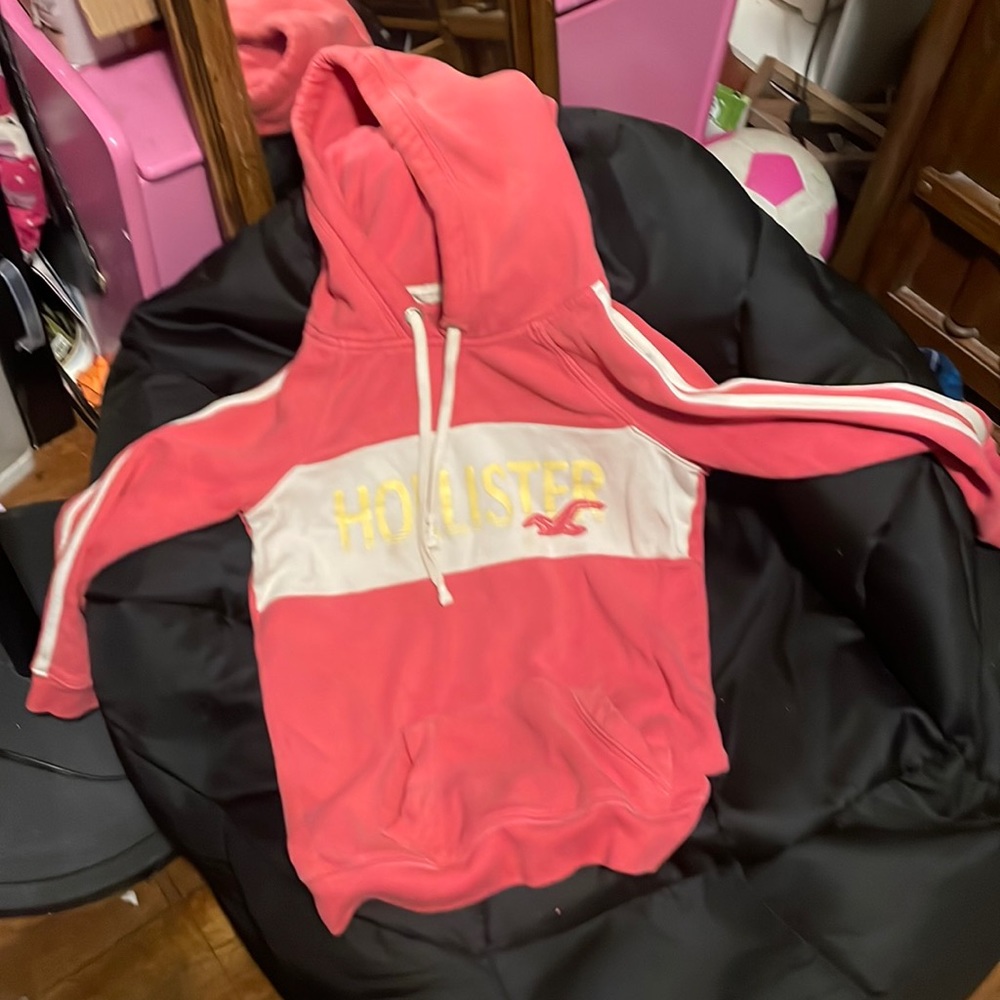 A Hollister sweater for kids size small